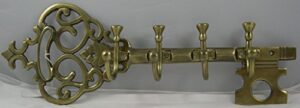 large brass plated skeleton key coat rack hook