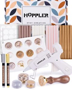 hoppler premium wax seal kit with sealing wax gun, wax seal sticks, wax seal stamp, 12 cavity silicone wax seal mold, and extra additions to make seals stand out and make invitations in bulk.