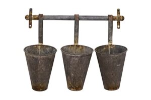 creative co-op antiqued metal wall rack with 3 hanging tin pots