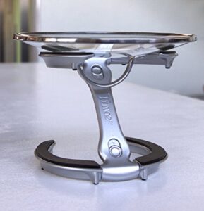 trivae unique patented pan lid, utensil and pot holder, dish / cake serving stand and trivet in one for the kitchen lover