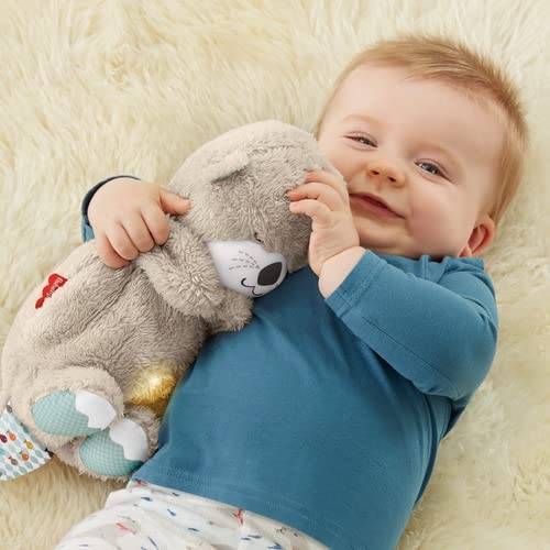 Fisher-Price Soothe 'n Snuggle Otter, Portable Plush Soother with Music, Sounds, Lights and Breathing Motion