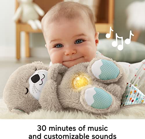 Fisher-Price Soothe 'n Snuggle Otter, Portable Plush Soother with Music, Sounds, Lights and Breathing Motion