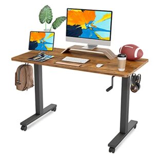 famisky crank adjustable height standing desk, 48 x 24 inches manual stand up desk, sit stand workstation for home office with handle and splice board, black frame/walnut top