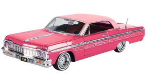 toy cars chevy impala lowrider hard top pink with graphics and light pink top get low series 1/24 diecast model car by motormax 79021
