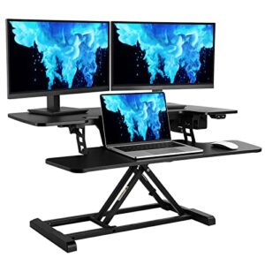 flexispot motorized standing desk converter 35″ wide electric stand up desk riser for monitor and laptop,black height adjustable desk for home office