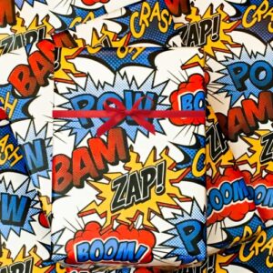 celebrate next superhero bow pow gift wrap wrapping paper folded with gift tags