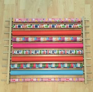 storage station, organizer, dispensing rack for gift wrapping paper, ribbons, cellophane, vinyl rolls, paper & other arts & crafts items. holds 10 rows. adjustable width. easy wall mount. hardware included.