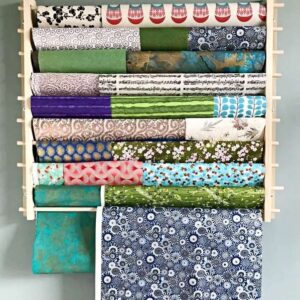 Storage Station, Organizer, Dispensing Rack for Gift Wrapping Paper, Ribbons, Cellophane, Vinyl Rolls, Paper & Other Arts & Crafts Items. Holds 10 Rows. Adjustable Width. Easy Wall Mount. Hardware Included.