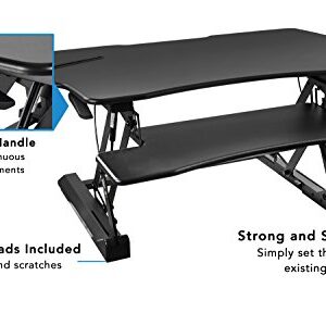 Mount-It! Height Adjustable Standing Desk Converter | 48” Wide Tabletop Sit Stand Desk Riser with Gas Spring | Stand Up Computer Workstation Fits Dual Monitors | Black | MI-7925