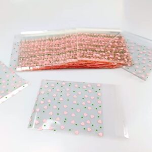 FAZHBARY 100 PCS Valentine Cellophane Bags Pink Heart Clear Cellophane Bags Small Gift Bags Self Sealing Cellophane Goodie Bags for Bakery Supplies