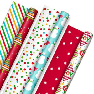 hallmark reversible christmas wrapping paper for kids (3 rolls: 120 sq. ft. ttl) orange and teal stripes, trees, ornaments, polka dots