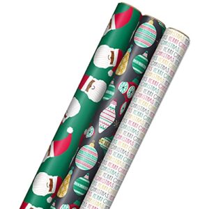 hallmark christmas wrapping paper for kids with cut lines on reverse (3 rolls: 120 sq. ft. ttl.) multicultural santa claus, ornaments on black, “merry christmas” in red, green and yellow