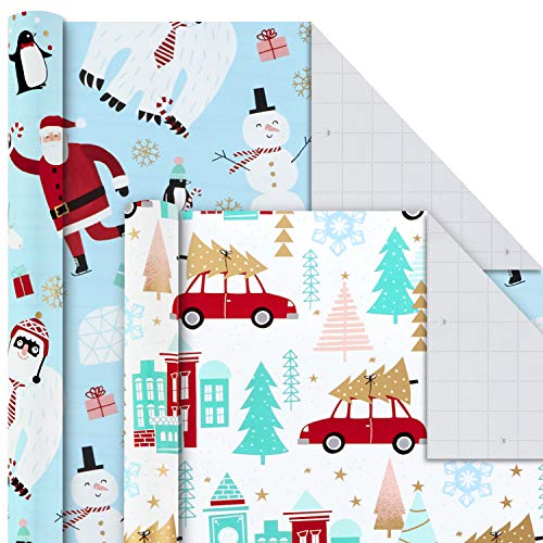 Hallmark Holiday Wrapping Paper Bundle with Cut Lines on Reverse, Quirky Christmas (Pack of 4, 120 sq. ft. ttl) Yeti, Santa, Penguin, Snowflakes, Blue, Gold