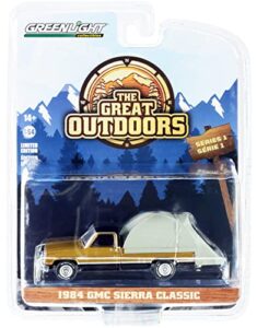1984 sierra classic pickup truck gold met. & black with modern truck bed tent the great outdoors 1/64 diecast model car by greenlight 38010 c