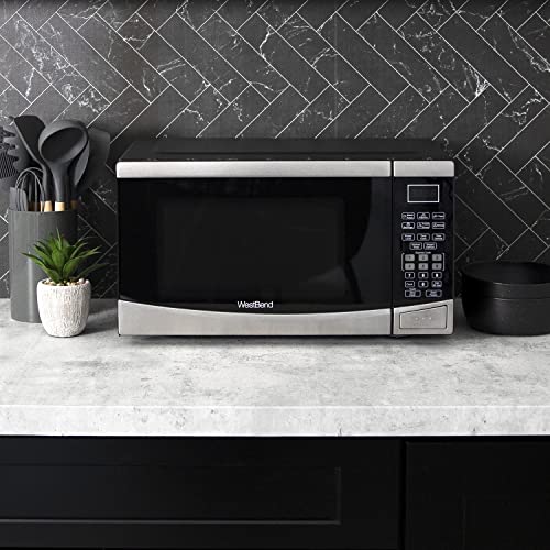 West Bend WBMW92S Microwave Oven 900-Watts Compact with 6 Pre Cooking Settings, Speed Defrost, Electronic Control Panel and Glass Turntable, Metallic