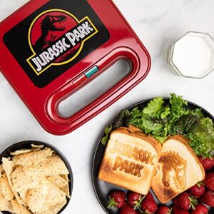 uncanny brands jurassic park grilled cheese maker- panini press and compact indoor grill- opens 180 degrees for burgers, steaks, bacon