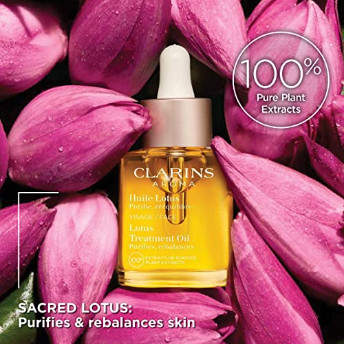 Clarins Lotus Face Treatment Oil | Hydrates, Tones and Balances Skin| Minimizes Fine Lines | Skin Is Immediately Velvety* | 100% Natural Plant Extracts | Oily To Combination Skin Types | 1 Fluid Ounce