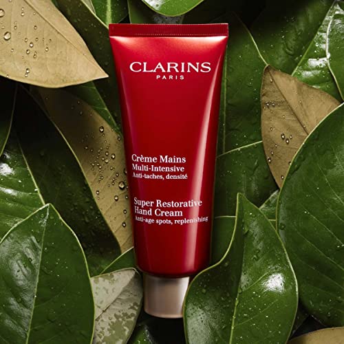 Clarins Super Restorative Hand Cream | Anti-Aging | Targets Dark Spots and Wrinkles | Promotes Youthful-Looking Hands Immediately and Over Time | Shea and Mango Butters Nourish, Soften and Smoothe