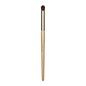 clarins eyeshadow brush | dense, rounded brush for shaping and smudging | blends cream and powder formulas | smudges eyeliner | ultra-soft synthetic fibers and sustainably sourced birch handle