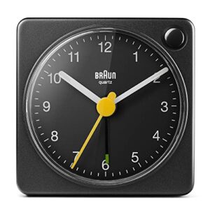 braun classic travel analogue clock with snooze and light, compact size, quiet quartz movement, crescendo beep alarm in black, model bc02xb, one