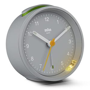 braun classic analogue alarm clock with snooze and light, quiet quartz movement, crescendo beep alarm in grey, model bc12g.