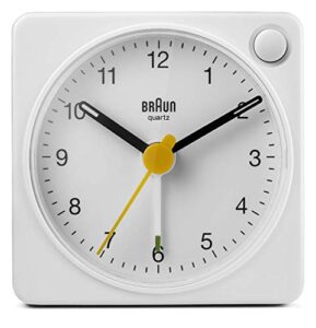 braun classic travel analogue clock with snooze and light, compact size, quiet quartz movement, crescendo beep alarm in white, model bc02xw, one