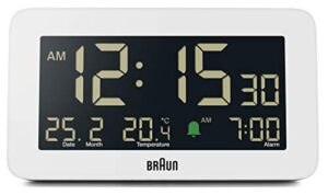 braun digital alarm clock with date, month and temperature displayed, negative lcd display, quick set, crescendo beep alarm in white, model bc10w.