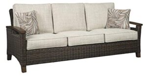 signature design by ashley paradise trail outdoor patio sofa with cushion and 2 pillows, brown & beige