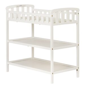 dream on me emily changing table in white, comes with 1″ changing pad, features two shelves, portable changing station, made of sustainable new zealand pinewood