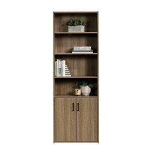 Sauder Beginnings Bookcase with Doors, L: 24.65" x W: 11.65" x H: 71.14", Summer Oak Finish