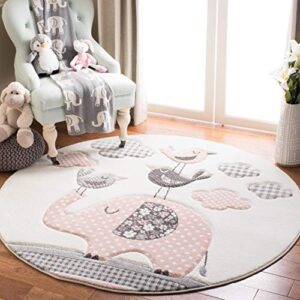 safavieh carousel kids collection 5’3″ round pink / ivory crk127p animal nursery playroom area rug