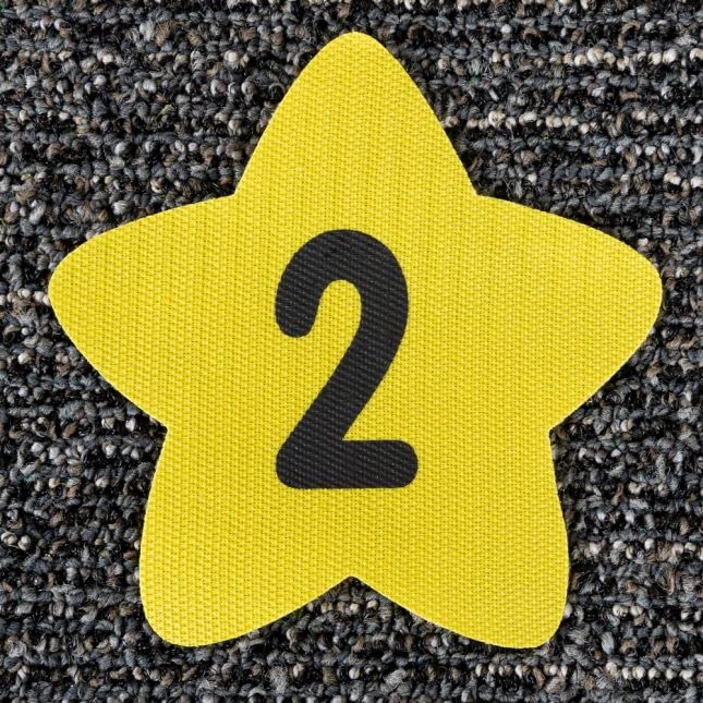 Really Good Stuff Carpet Mark-Its – Numbers 0-25, 5” by 5” (Set of 26) – Star-Shaped Yellow Carpet Spots - Assign Floor Seating, Play Games – Durable, No-Slide Back