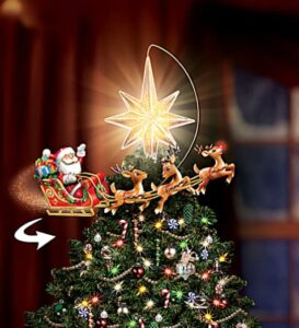 rudolph the red-nosed reindeer hand-painted tree topper featuring a hand-painted santa, sleigh & reindeer team that rotates around an illuminated star