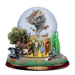 the land of oz glitter globe with motion and music by the bradford exchange