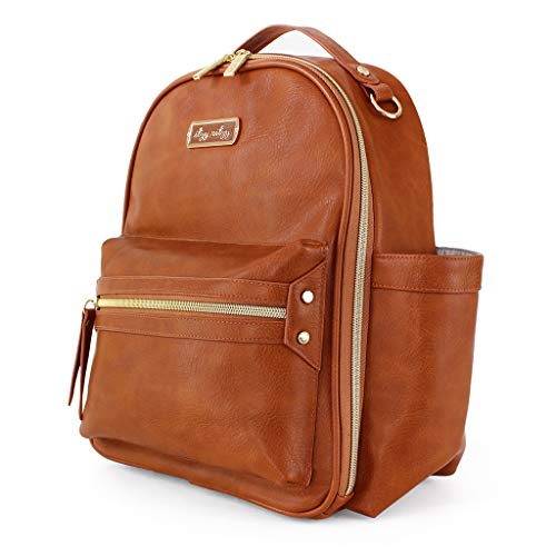 Itzy Ritzy Mini Diaper Bag Backpack - Chic Mini Diaper Bag Backpack with Vegan Leather Changing Pad, 8 Total Pockets (4 Internal and 4 External), Grab-Top Handle and Rubber Feet, Cognac