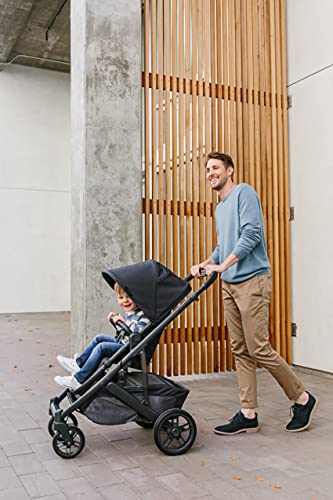 Cruz V2 Stroller – Greyson (Charcoal mélange/Carbon/Saddle Leather) + Bassinet – Greyson (Charcoal mélange/Carbon)