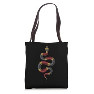 poisonous red black and yellow snake tote bag