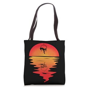 aerial hanging aerialist vintage sunset trapeze aerial silk tote bag