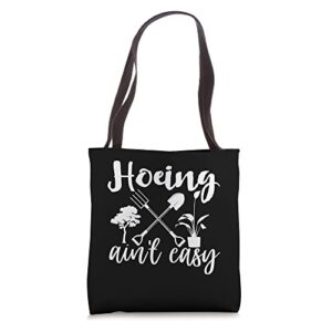 hoeing ain’t easy funny gardening tote bag