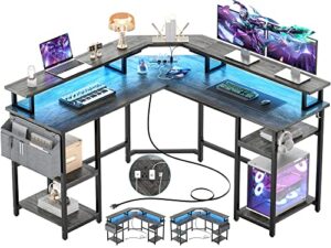 aheaplus l shaped gaming desk with power outlets & led lights, l- shaped desk computer corner desk with monitor stand and storage shelf, home office desk writing desk with storage bag, grey oak