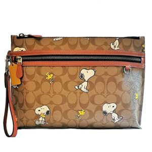 COACH Peanuts Carry All Pouch With Snoopy Woodstock Print