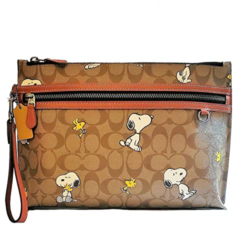 COACH Peanuts Carry All Pouch With Snoopy Woodstock Print