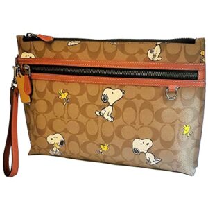 COACH Peanuts Carry All Pouch With Snoopy Woodstock Print