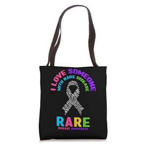 i love someone with rare disease awareness tote bag
