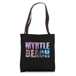 city skyline with the skywheel inside myrtle beach letters tote bag