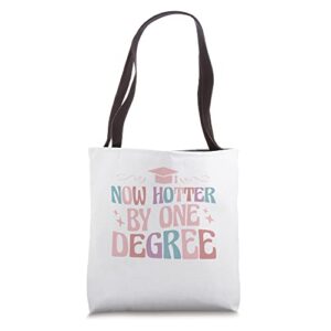 now hotter by one degree funny graduation tote bag