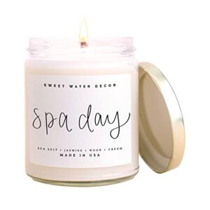 sweet water decor spa day candle | sea salt, jasmine, and wood relaxing scented soy wax candle for home | 9oz clear jar, 40 hour burn time, made in the usa