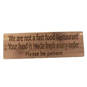 we are not a fast food restaurant your food is made fresh every order please be patient sign – cedar wood