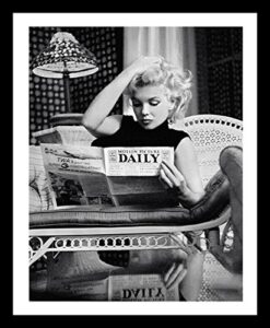 buyartforless framed marilyn monroe reading motion picture daily 1955 by ed feingersh 20×16 photograph art print poster