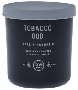 dw home tobacco oud scented candle in a glass jar with a rubber lid
